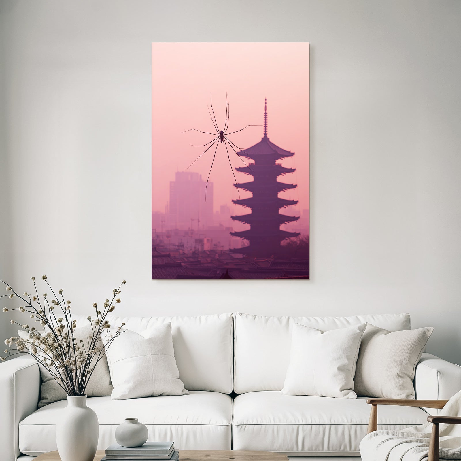 Spider silhouette in front of pagoda building in pastel pink sky