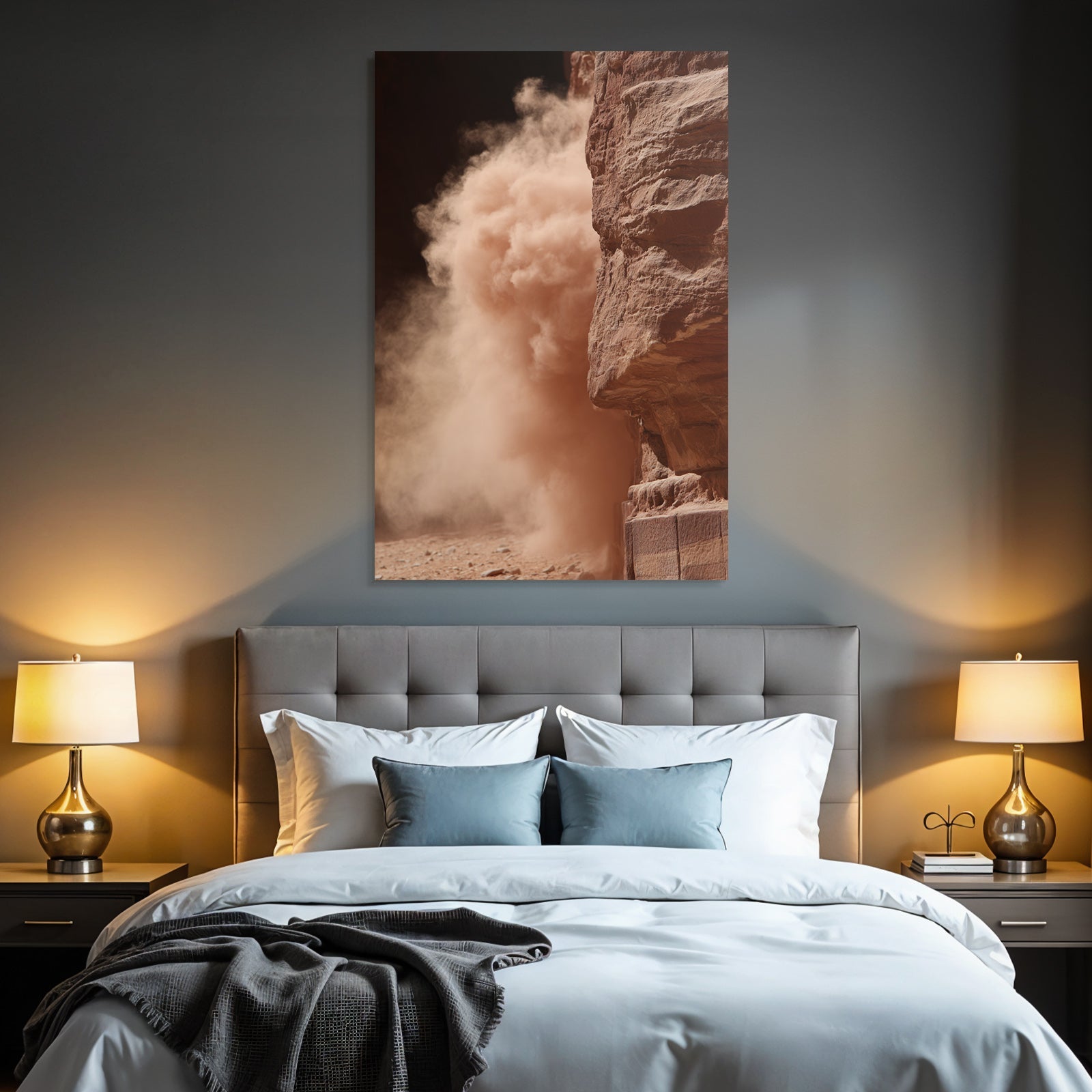 Dust cloud in desert next to rock formation