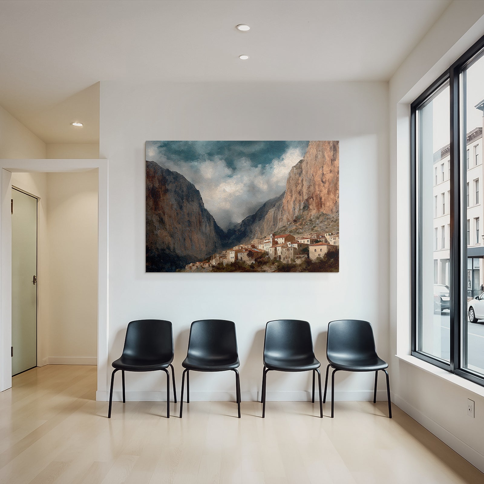 Picturesque mountain landscape with village at the foot of the steep cliffs