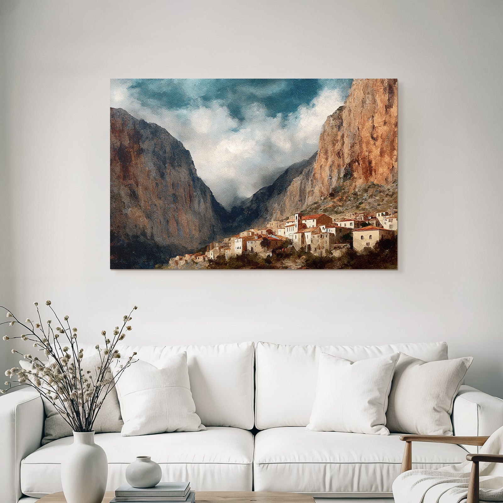 Picturesque mountain landscape with village at the foot of the steep cliffs