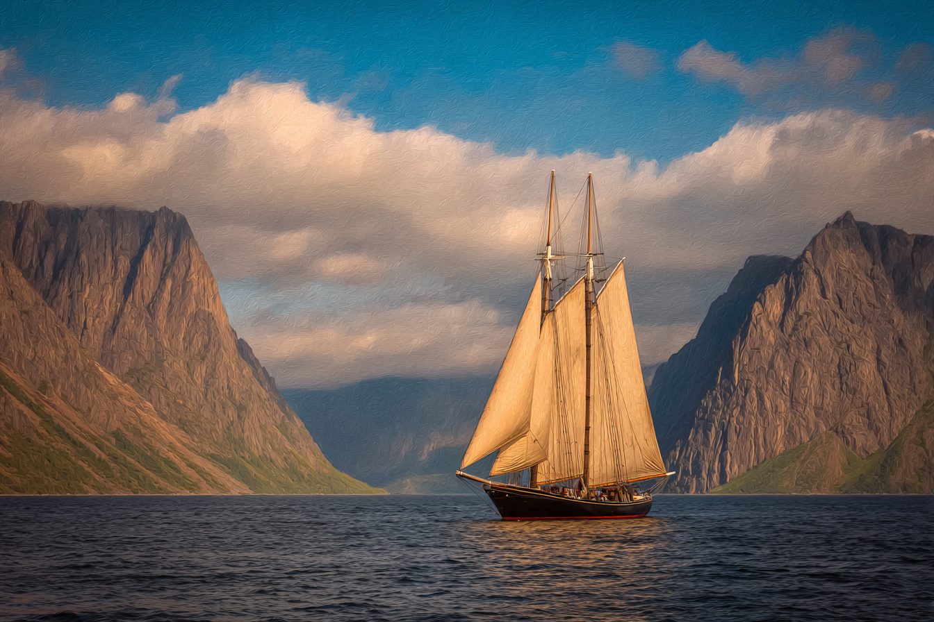 Segelboot Mit Mehreren Segeln In Einer Schönen Landschaft Mit Bergen Und Blaüm Himmel | Boote und Schiffe | Mobilitaet und Technik