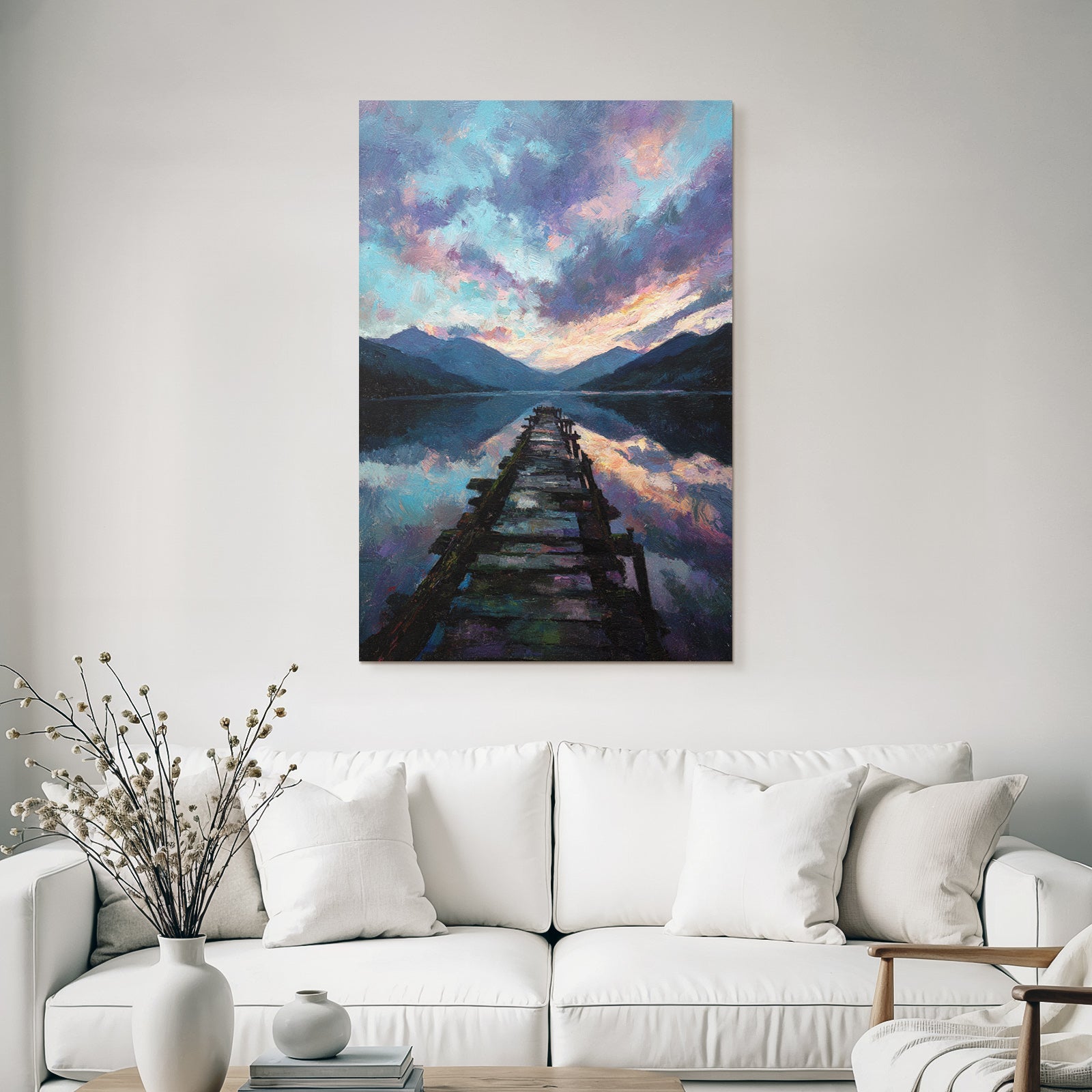Pier at the peaceful mountain lake at sunset