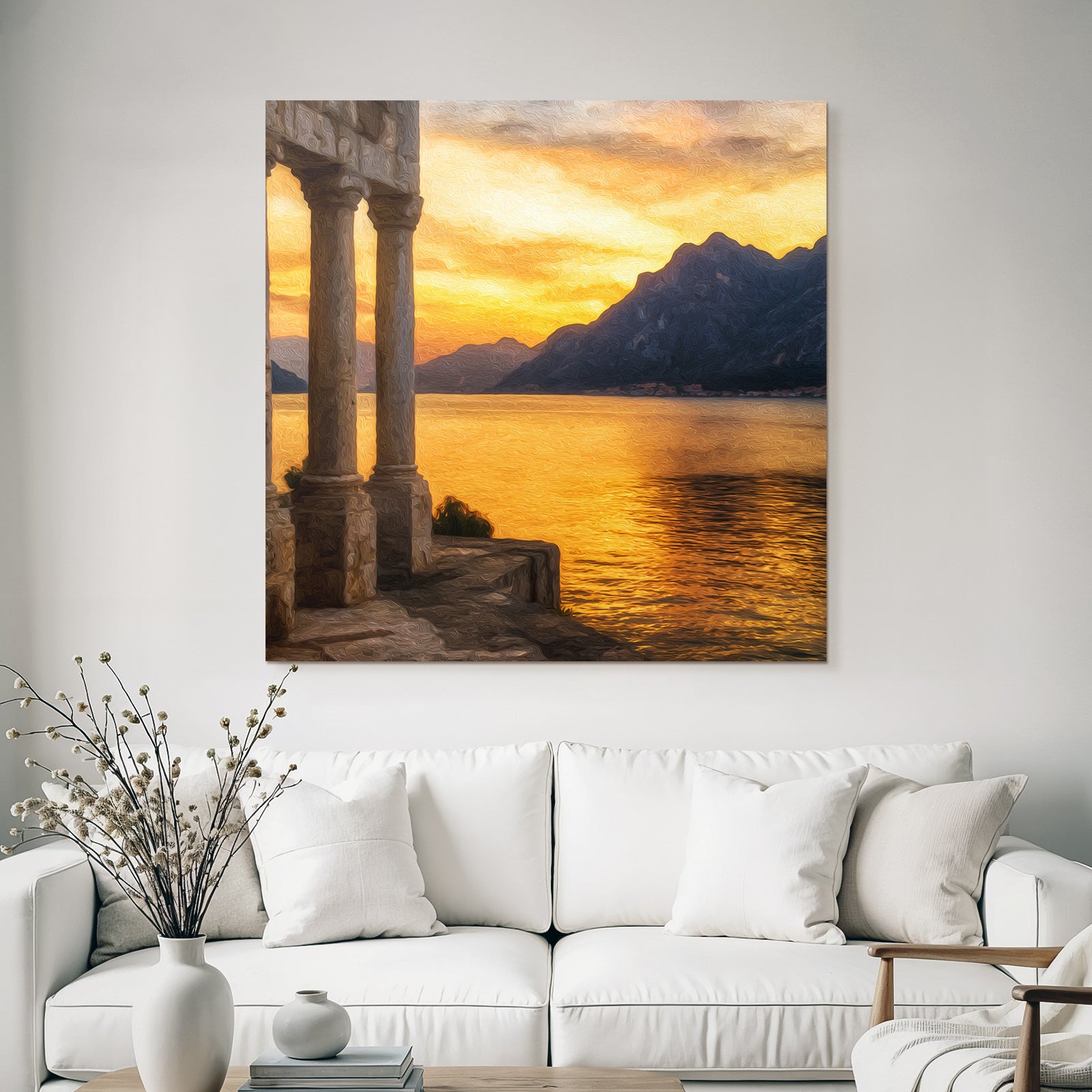 Sunset landscape with mountains and pillars by the water