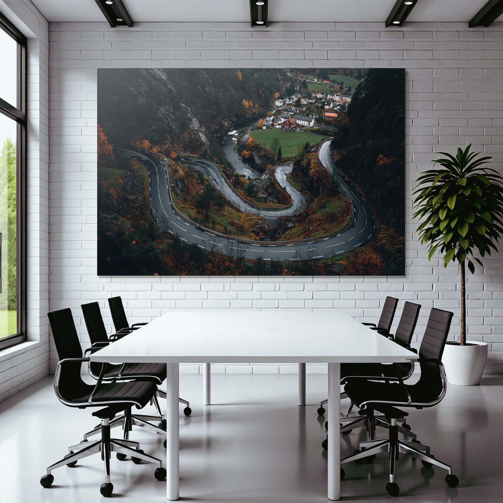 Winding Road In Mountainous Landscape With Autumn Foliage Village And River