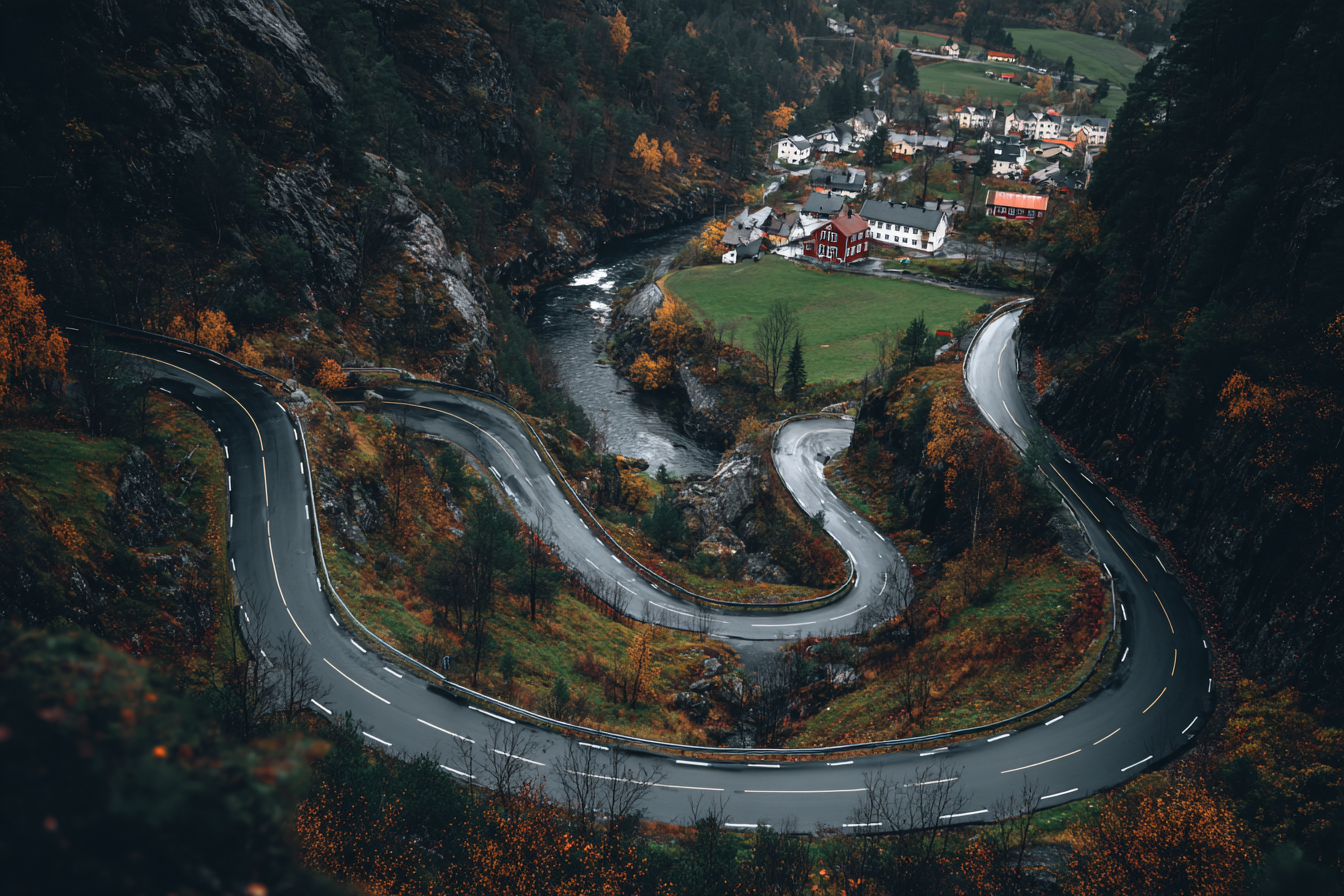 Winding Road In Mountainous Landscape With Autumn Foliage Village And River | Reisen und Outdoor | Themen und Hobbys