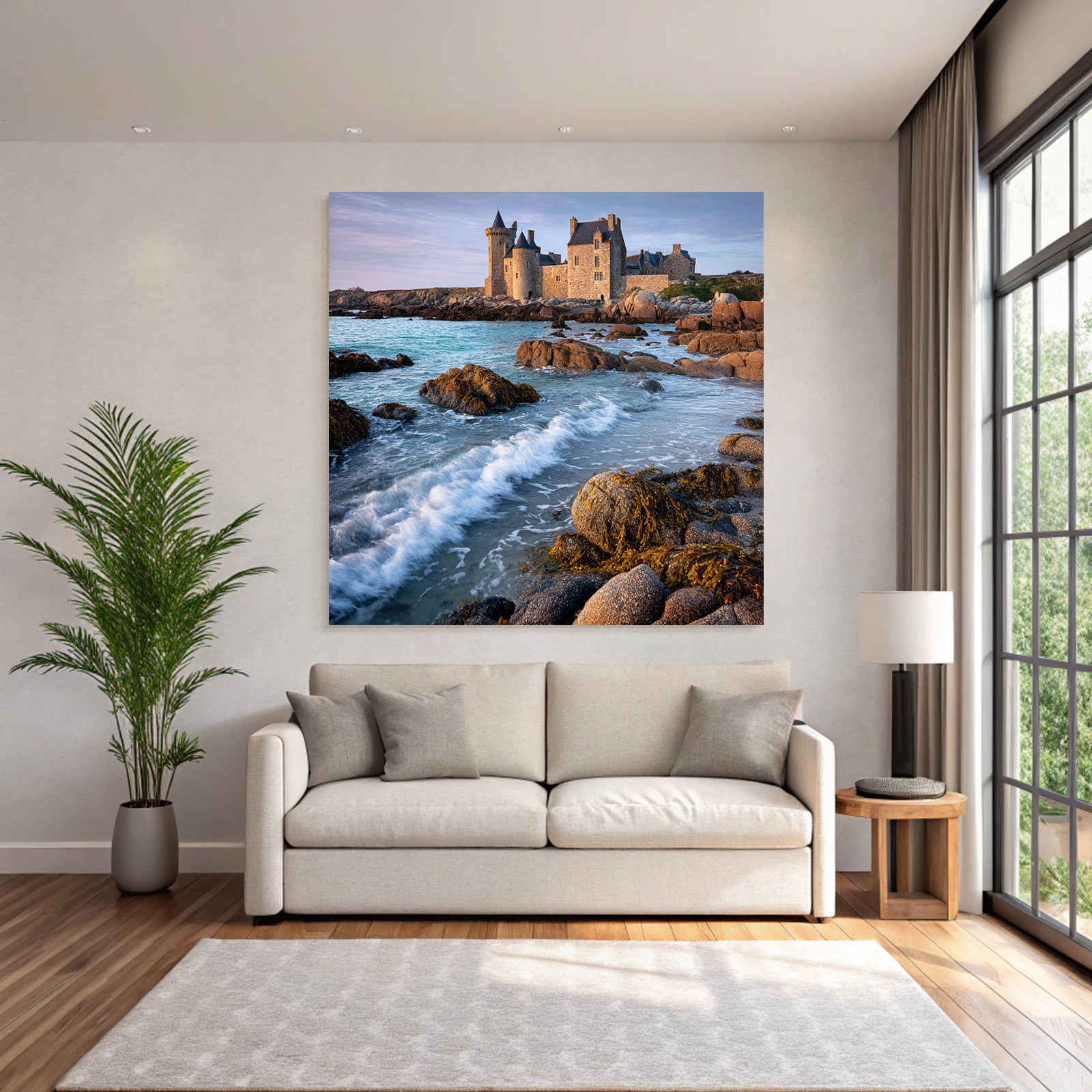 Coastal stone building with towers and calming wash on the horizon