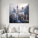 Castle in the snow surrounded by mountains and trees