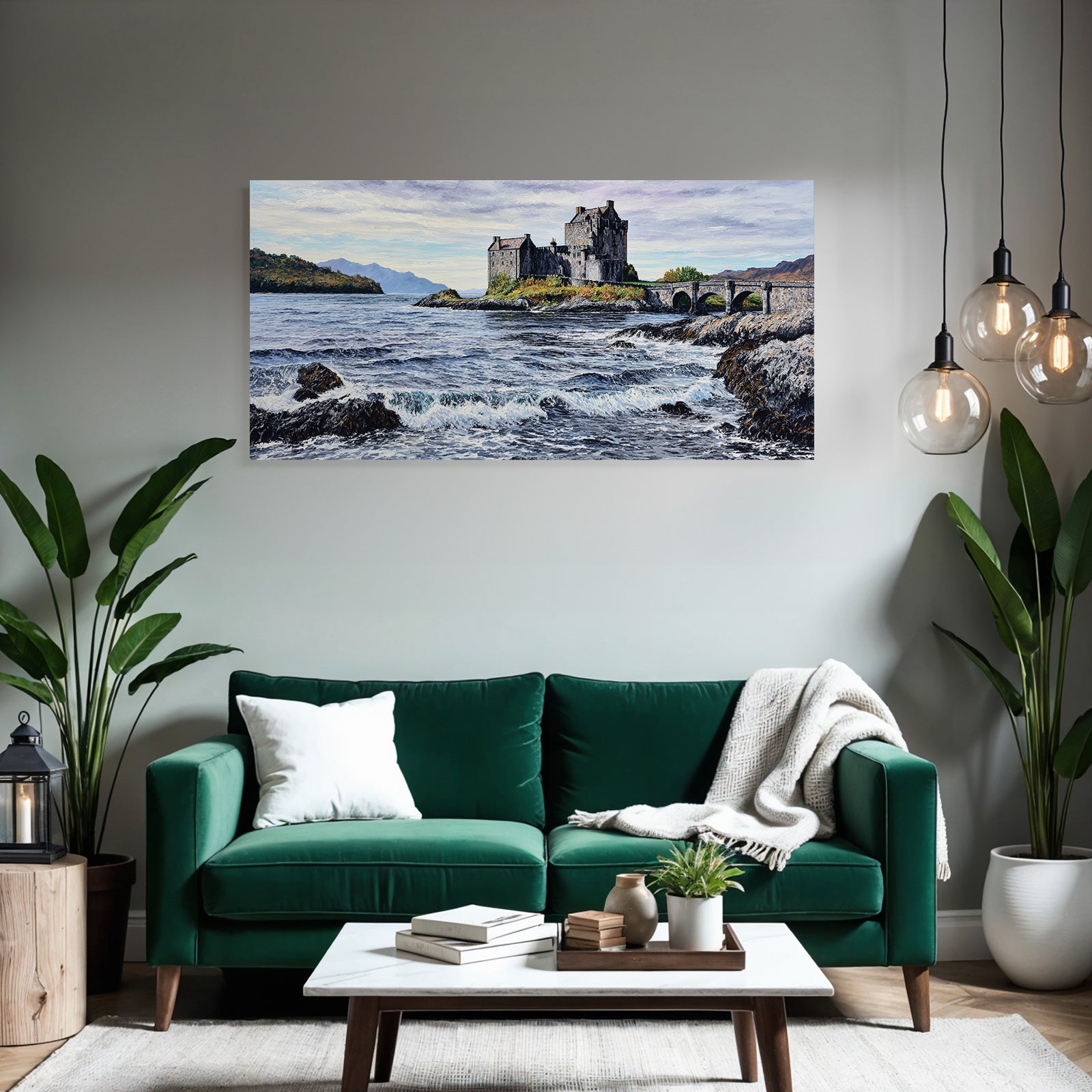 Castle on rock by the sea with bridge and mountains in the background