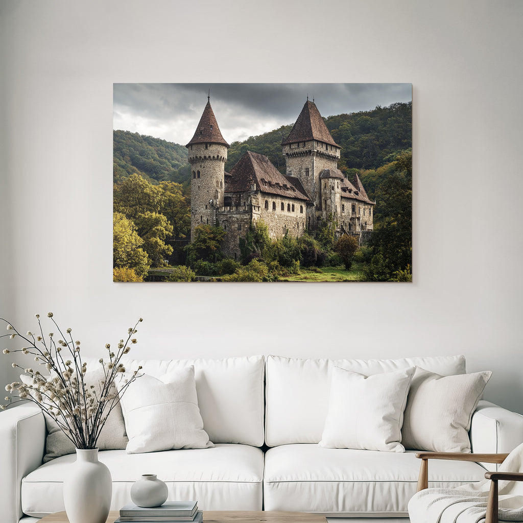 Historic castle with tower in the green under a gloomy sky