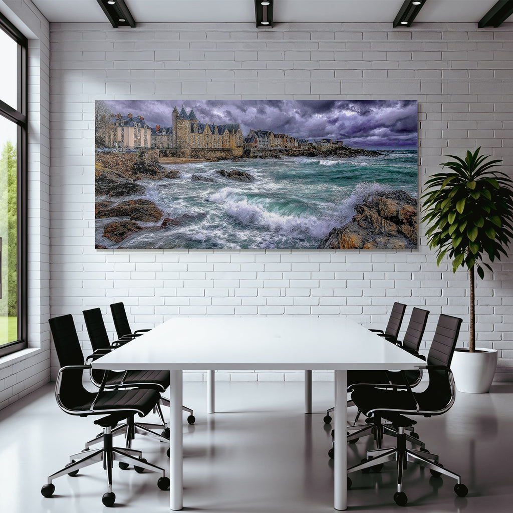 Coastal landscape with rocks, waves and old buildings