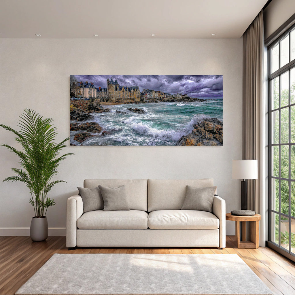 Coastal landscape with rocks, waves and old buildings
