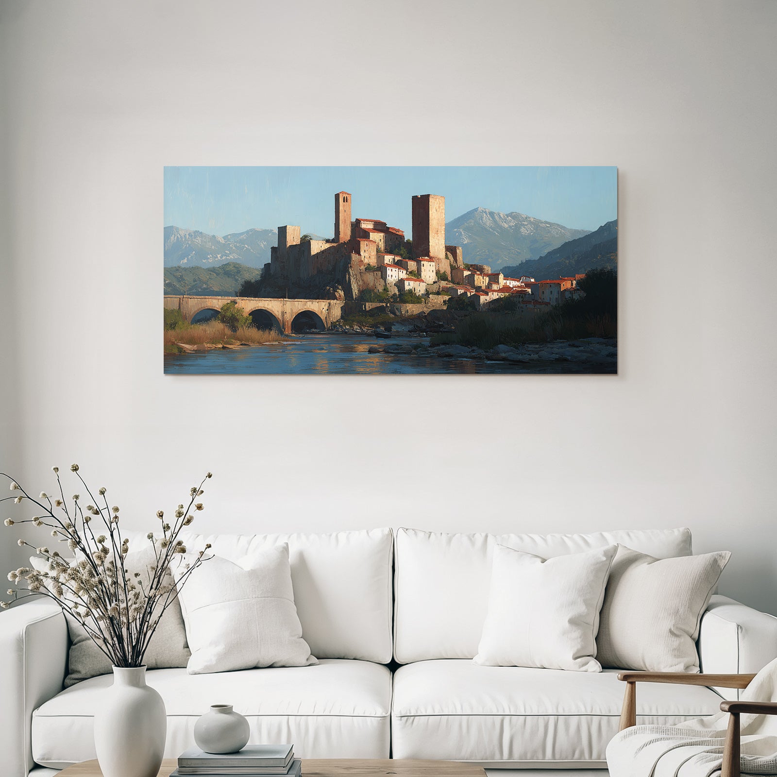 Medieval castle on hill with river and mountains