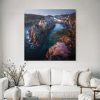 Rocking board with house surrounded by water and green landscape