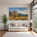 Flowering Tree In Field Surrounded By Hills And Mountains Scenes