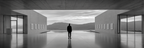 Minimalistische Architektur Mit Person Und Ausblick Auf Berge Und Wasser | Fotografie | Kunstgattungen