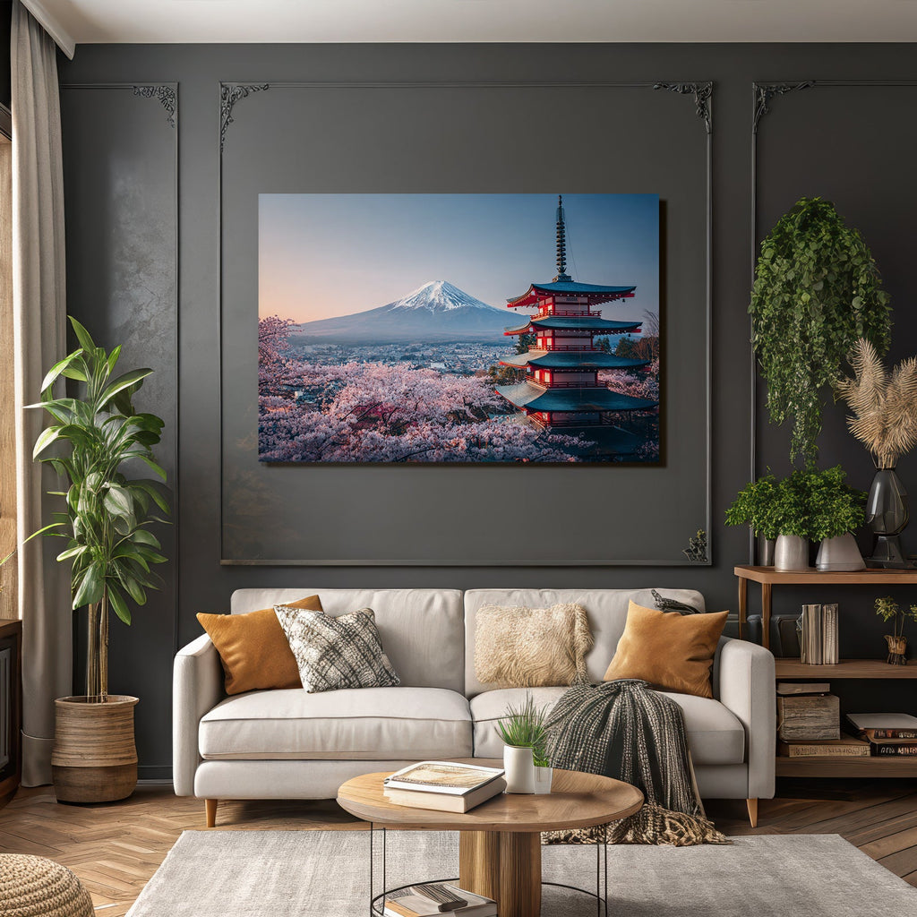 Japanese pagoda and cherry blossoms in front of a snow-capped mountain