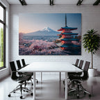 Japanese pagoda and cherry blossoms in front of a snow-capped mountain
