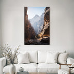 Steep rock walls in a gorge with sunlight