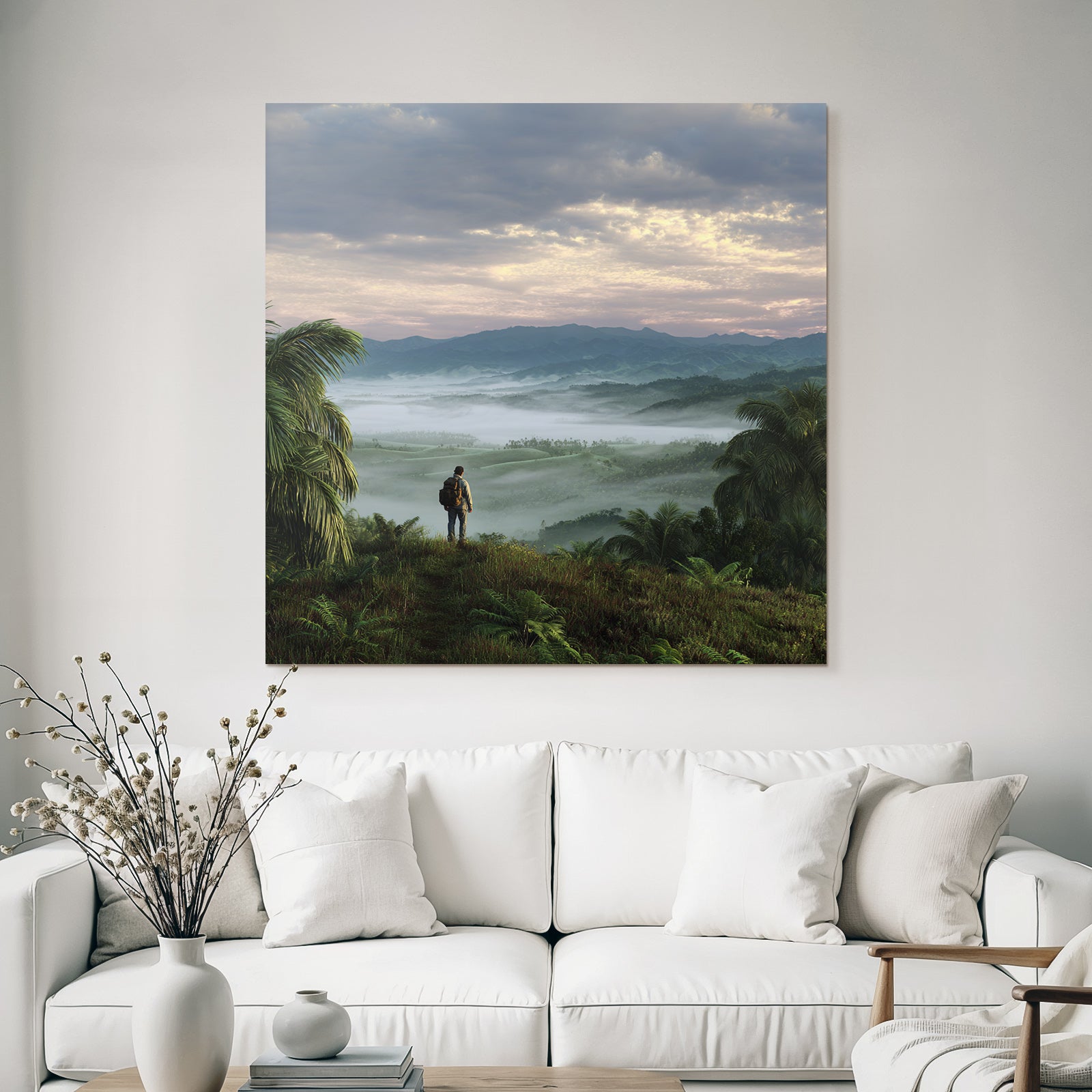 Tropics and jungle person on hill overlooking country landscape with mountains and mist
