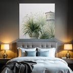 Tropical and jungle plants in flowerpots next to water tower painting