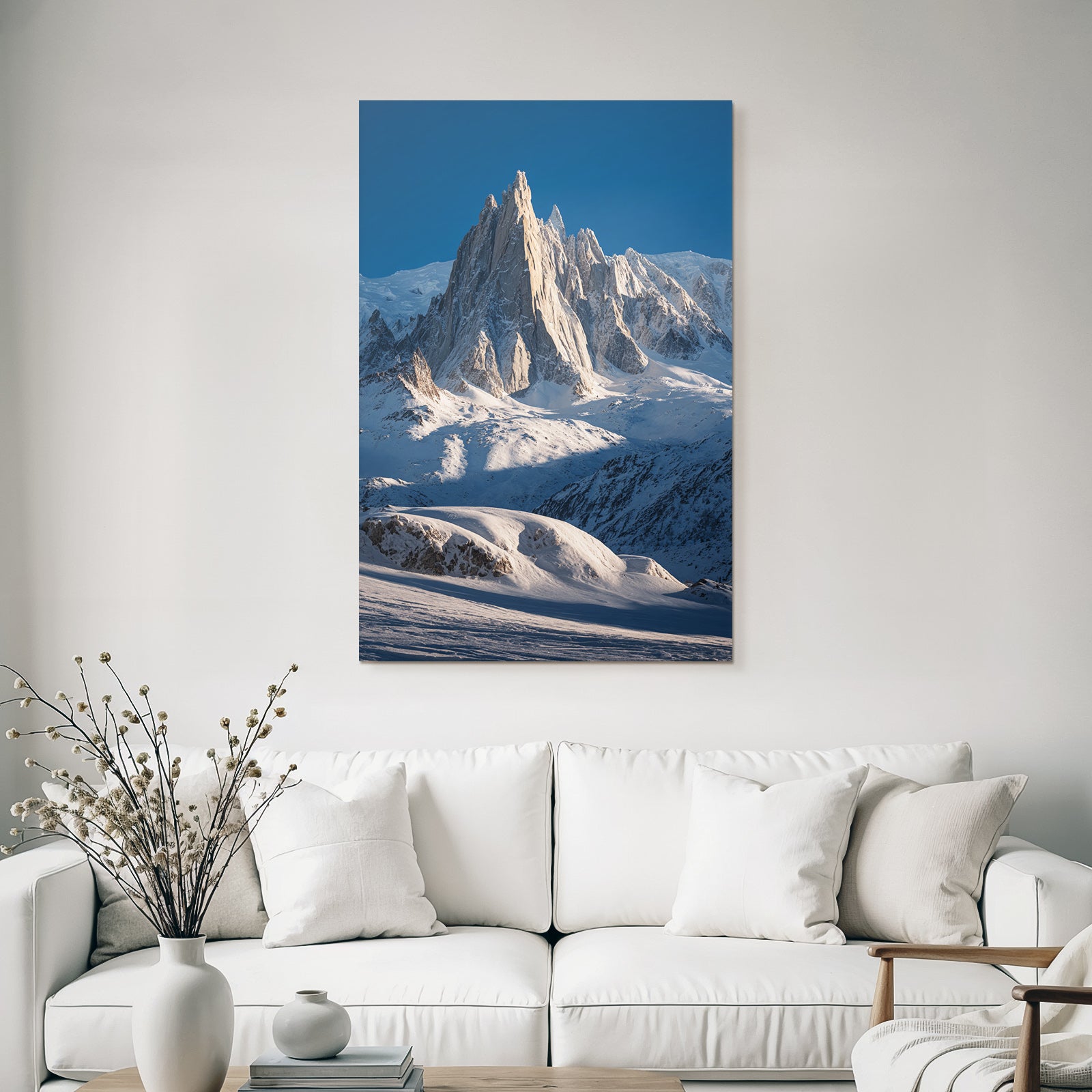 Winter Dramatic View of Snow-Capped Mountains with Jagged Peak in the Sky