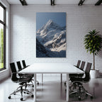 Winter Majestic Snow-capped Mountain Peak Under a Clear Blue Sky