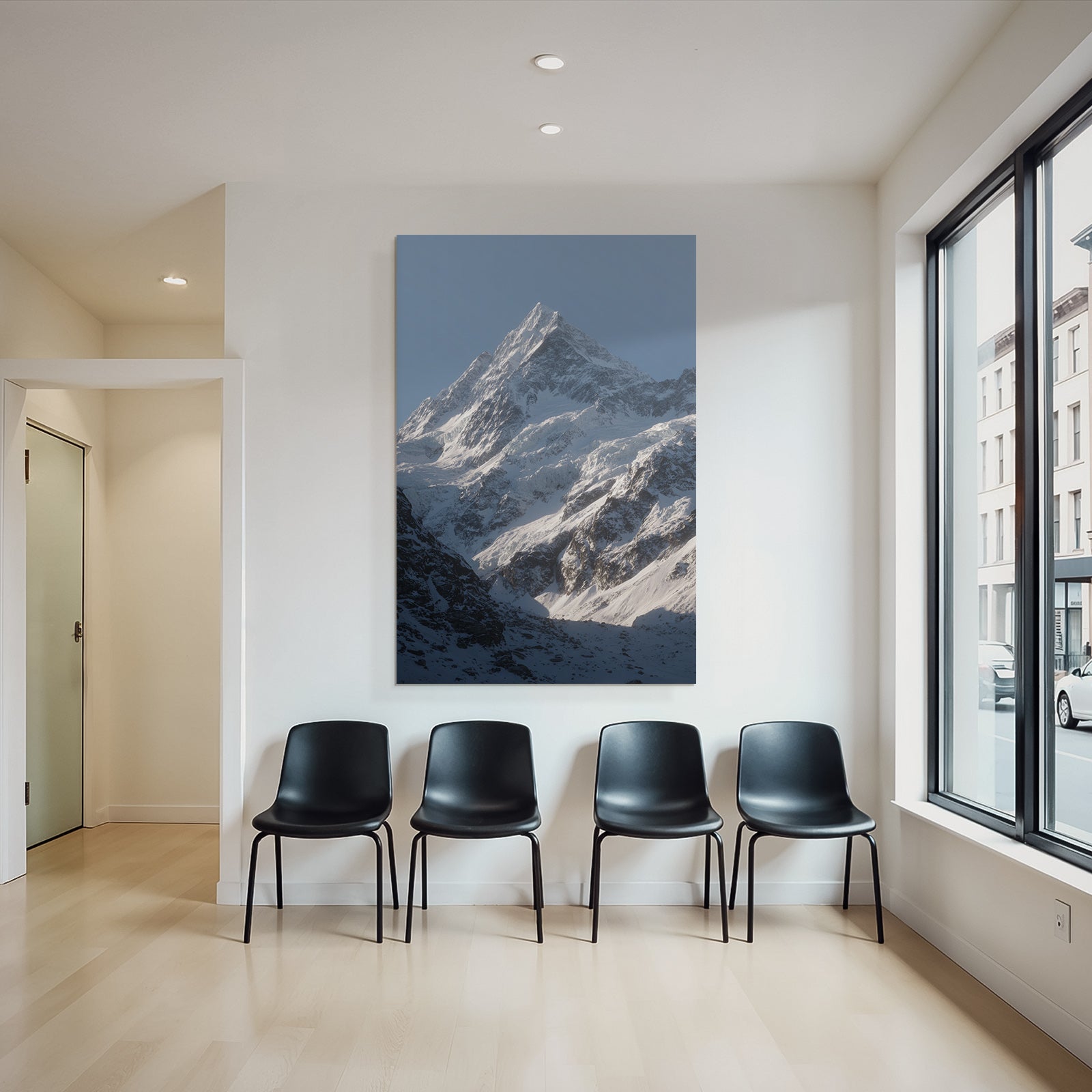 Winter Majestic Snow-capped Mountain Peak Under a Clear Blue Sky
