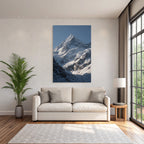 Winter Majestic Snow-capped Mountain Peak Under a Clear Blue Sky