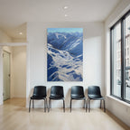 Winter snow-covered mountain landscape with blue sky