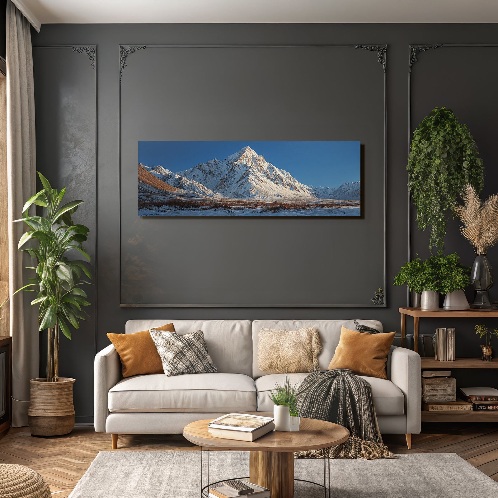 Winter mountain landscape with snow-capped peaks and blue sky