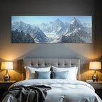 Winter mountainous snow-capped peaks and blue skies