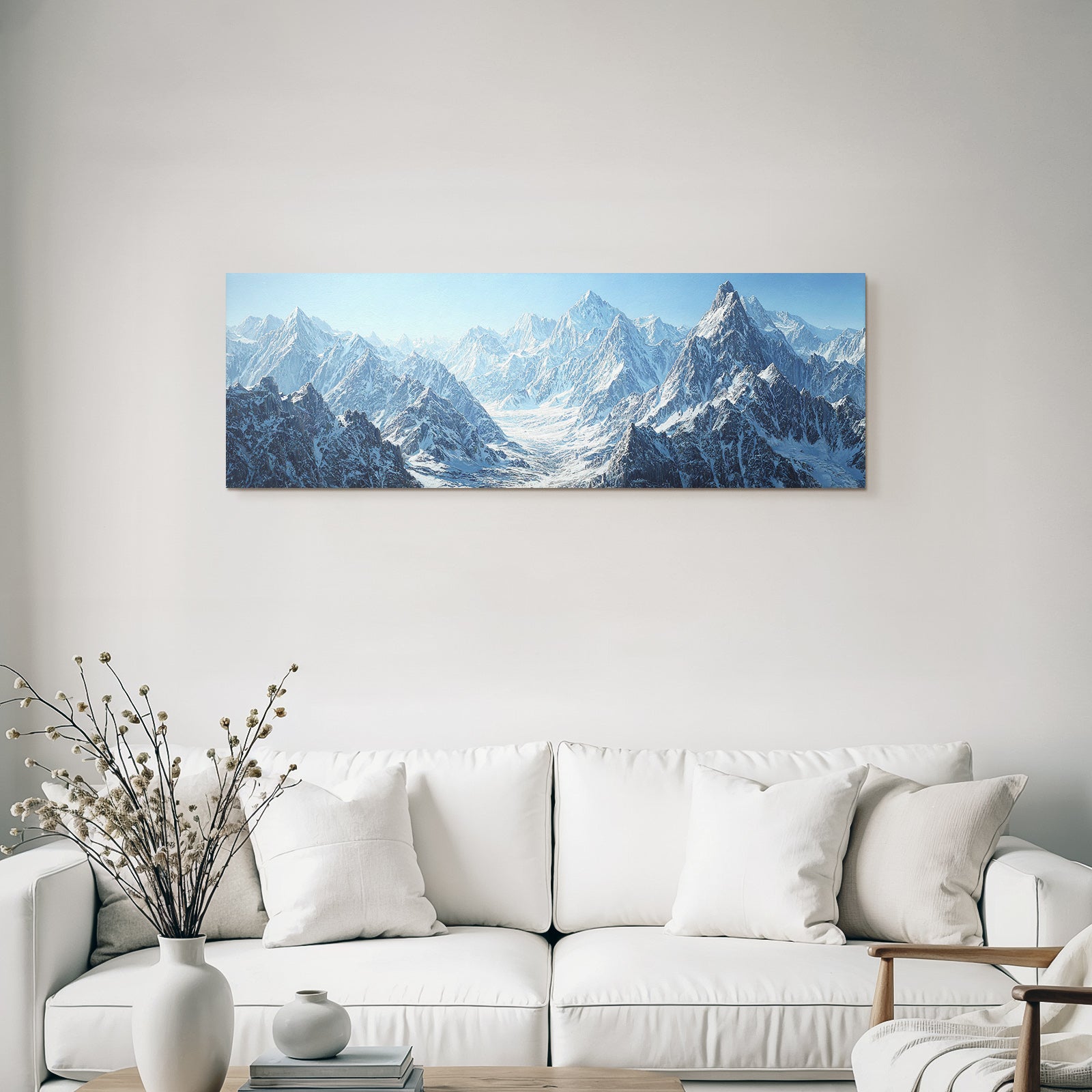 Winter mountainous snow-capped peaks and blue skies