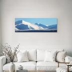 Winter snow-capped mountains under a clear blue sky