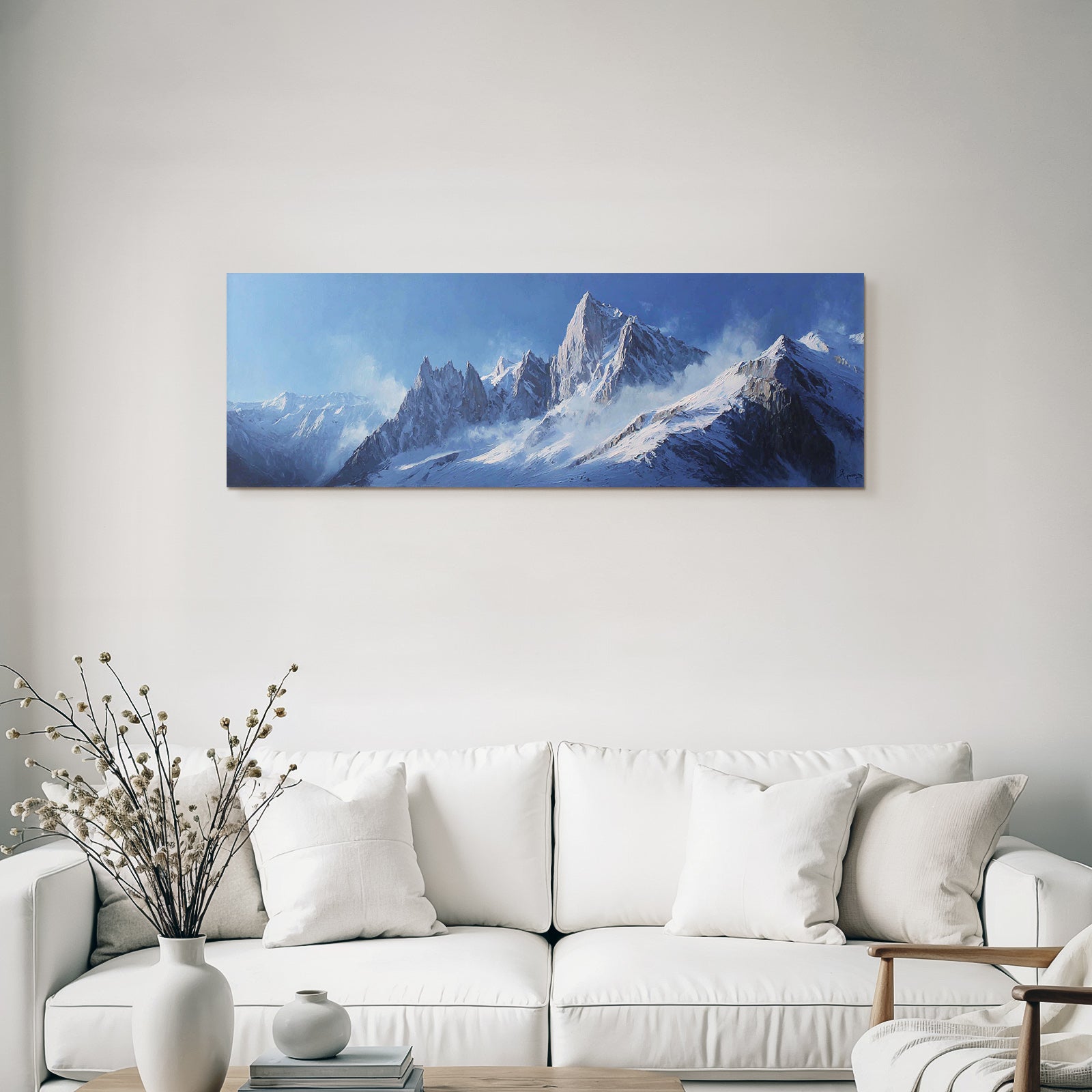 Winter snow-capped mountains against a clear blue sky