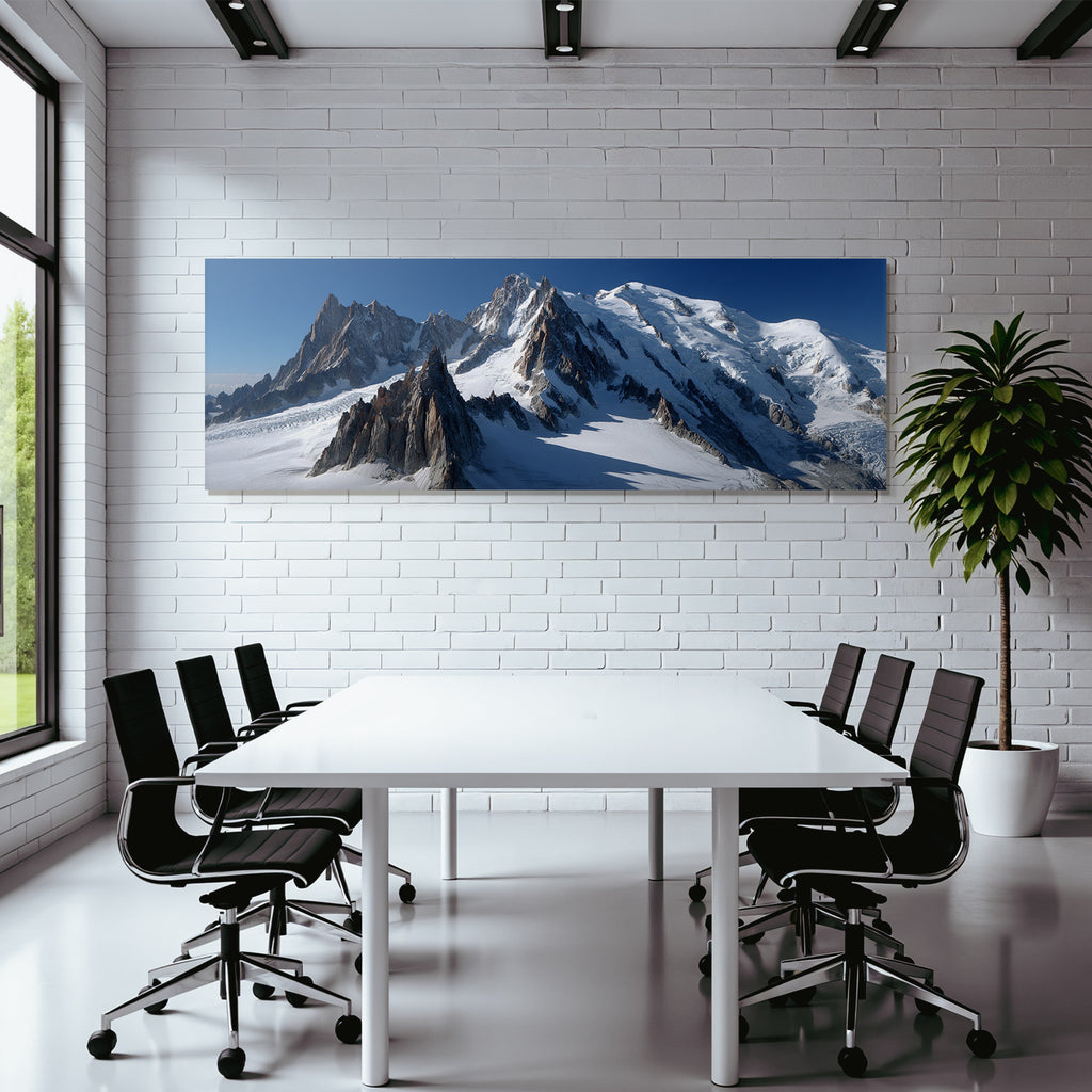 Winter view of snow-capped mountains with glaciers and rocks