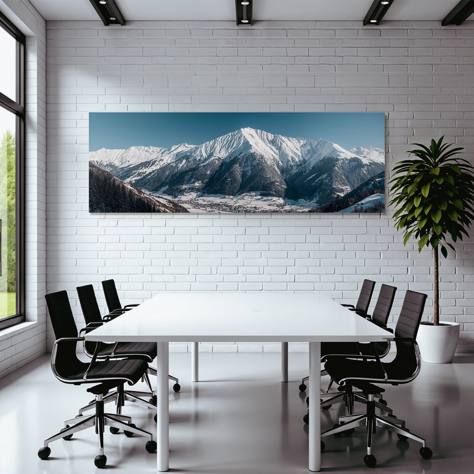 Winter of snow-capped mountains with village in the valley