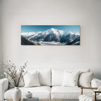 Winter of snow-capped mountains with village in the valley