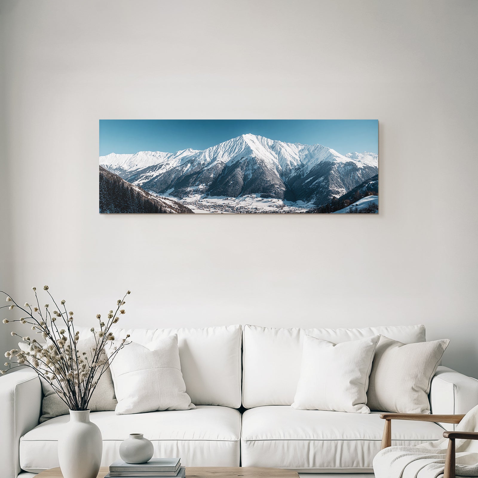 Winter of snow-capped mountains with village in the valley