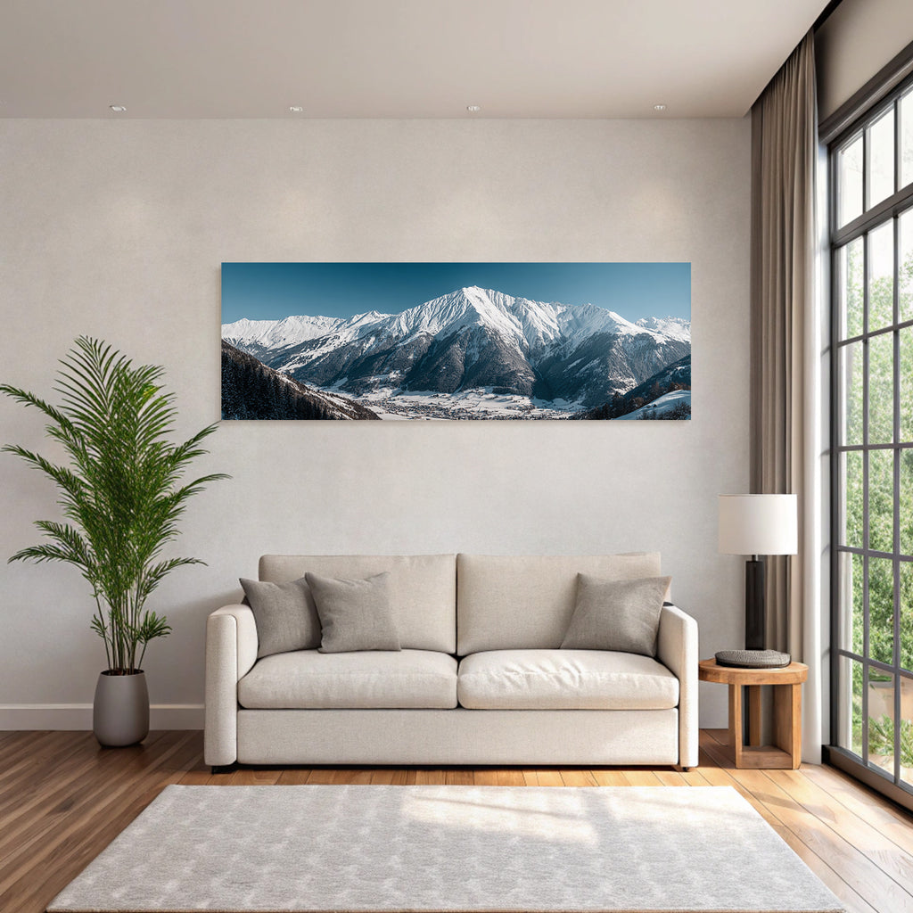 Winter of snow-capped mountains with village in the valley