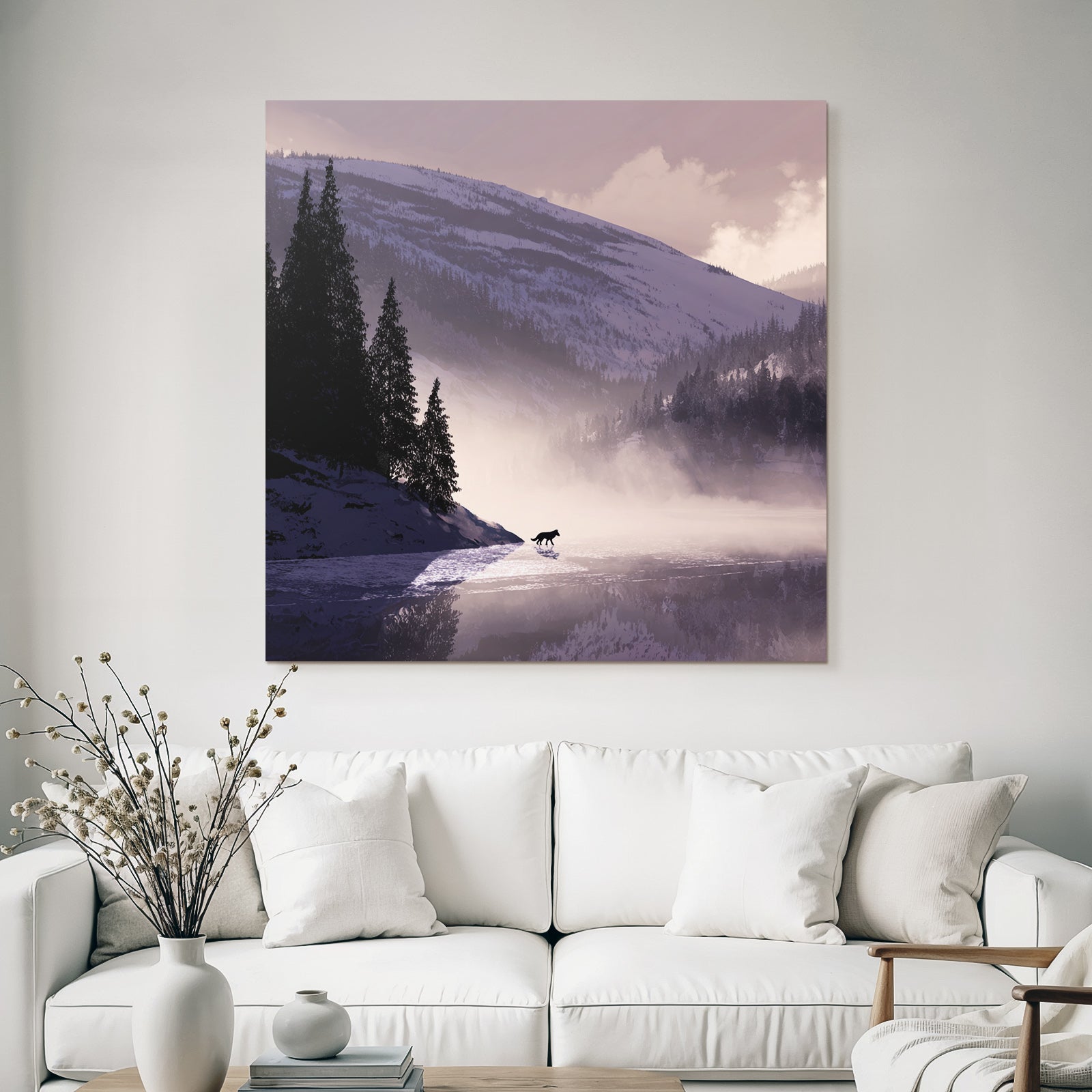 Winter tranquil snowy landscape with wolf at water's edge