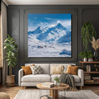 Winter snow-covered mountain landscape with clear blue sky