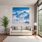 Winter snow-covered mountain landscape with clear blue sky