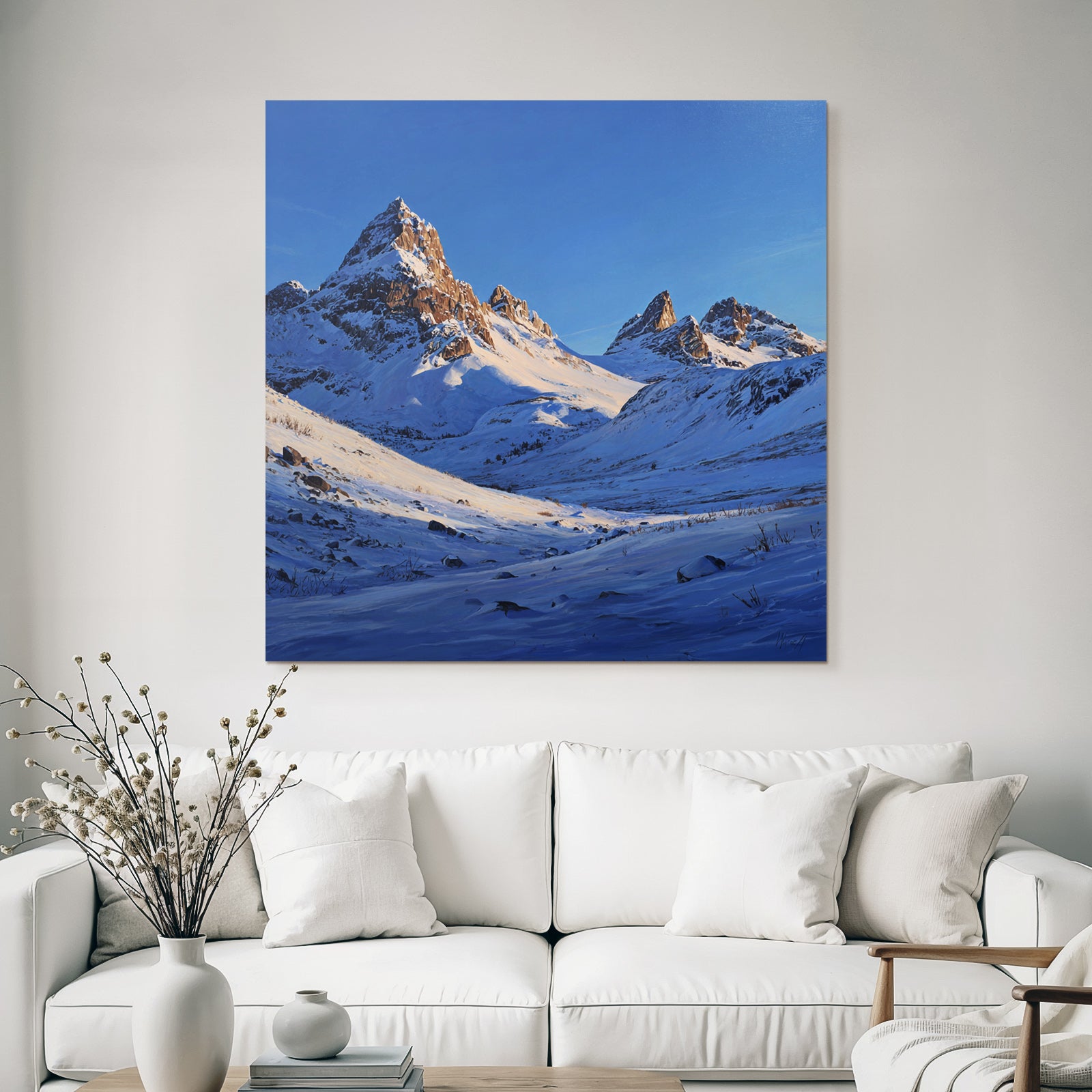 Winter snow-covered mountain landscape under a clear blue sky