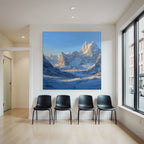 Winter landscape with snow-capped mountains in the valley
