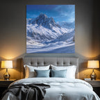 Winter landscape with snow-capped mountains and clear sky