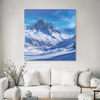 Winter landscape with snow-capped mountains and clear sky