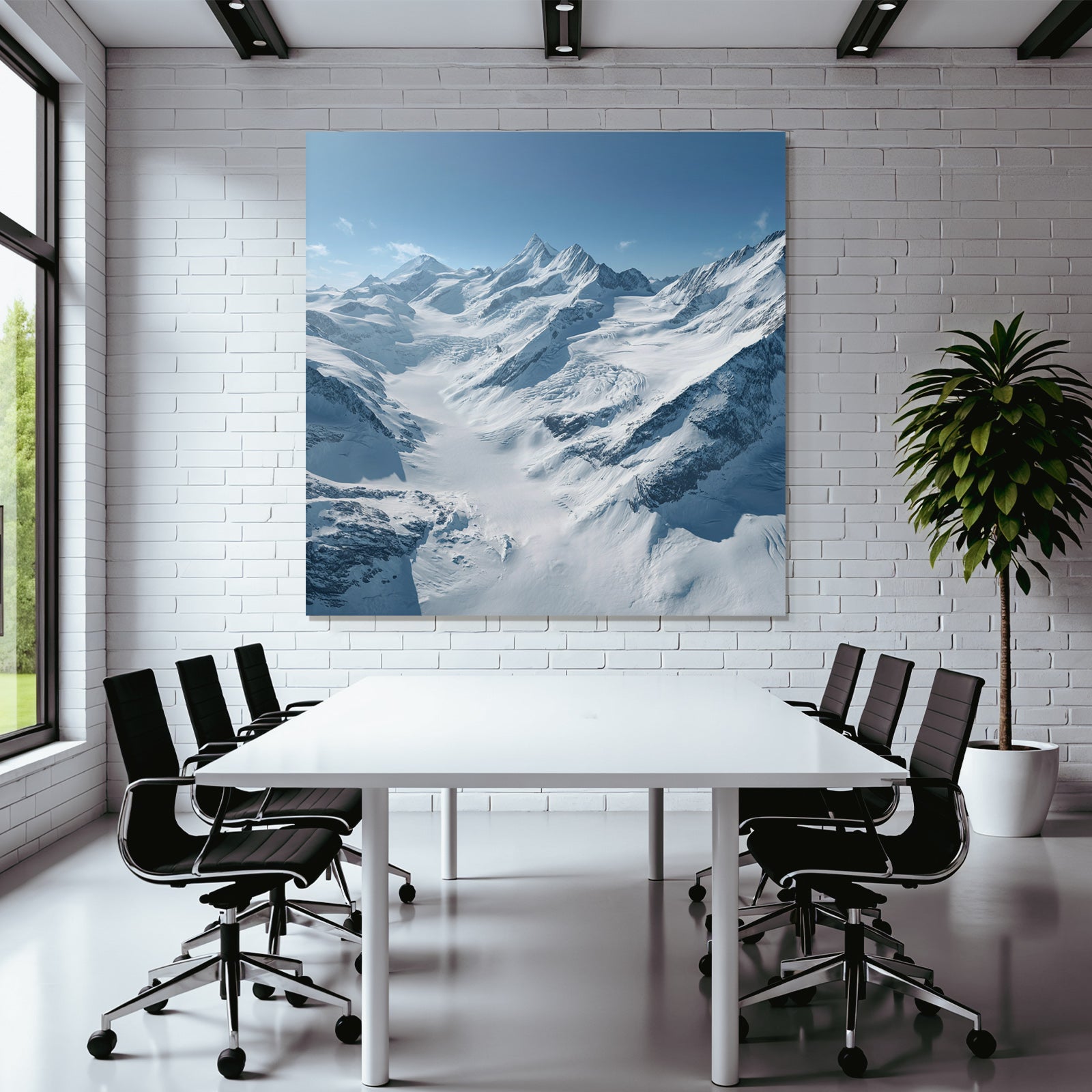 Winter landscape with snow-capped mountains and glaciers and blue sky