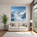 Winter landscape with snow-capped mountains and glaciers and blue sky