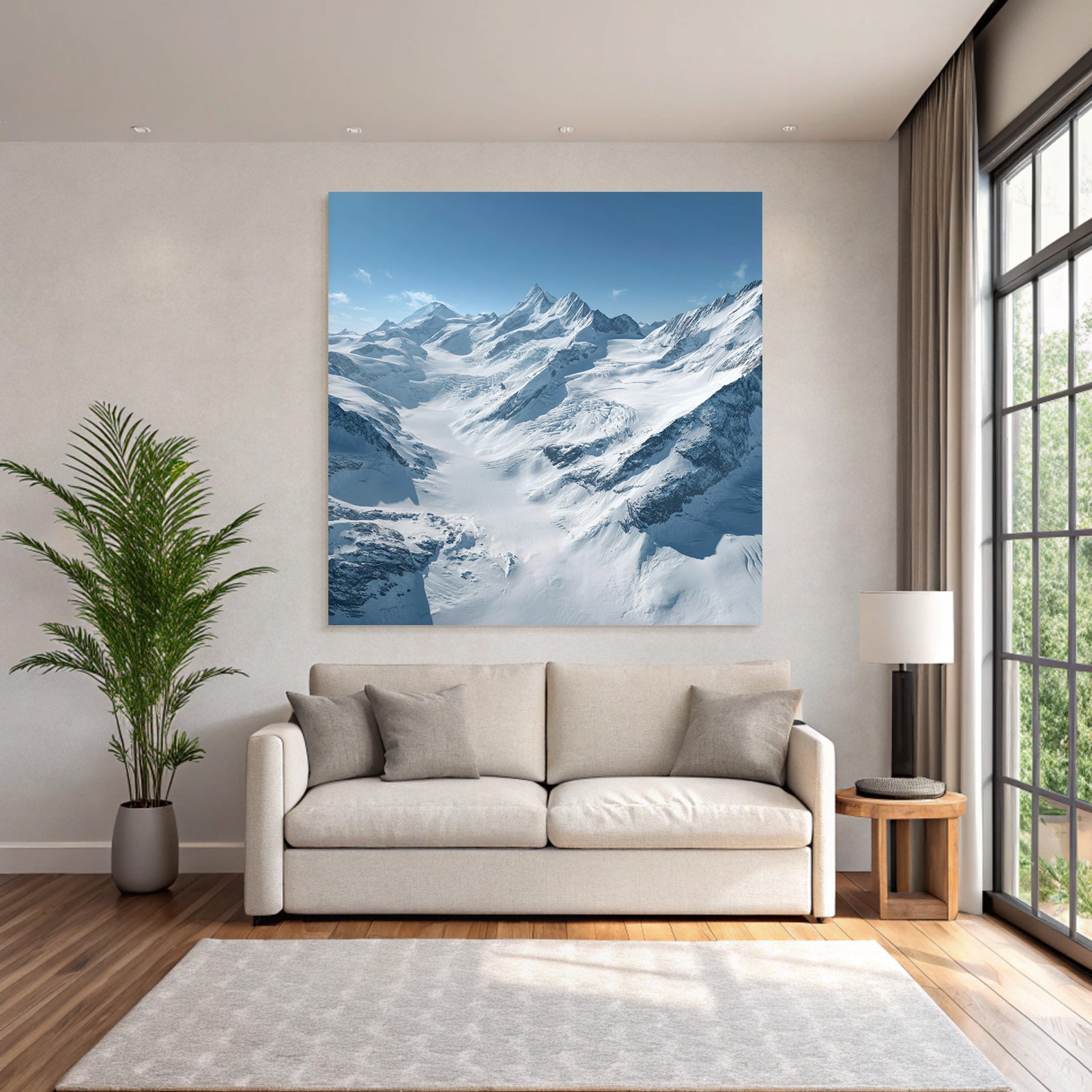 Winter landscape with snow-capped mountains and glaciers and blue sky