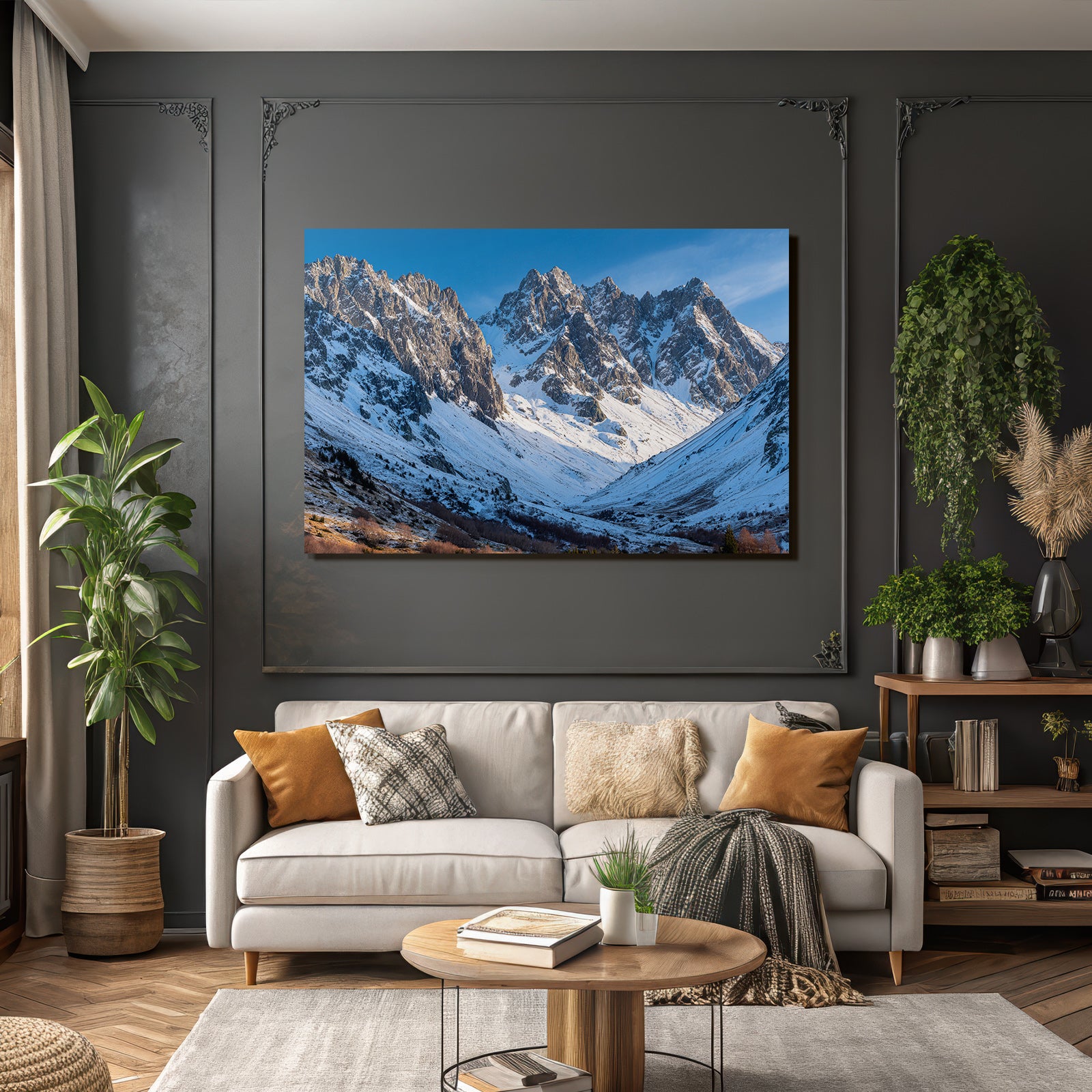 Winter mountain landscape with snow-capped peaks and blue sky